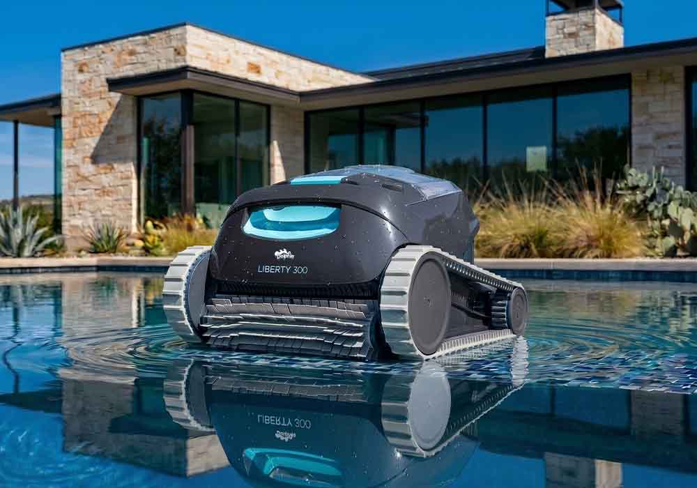 Dolphin Liberty 300 at the surface by the pool edge, ready to be picked up