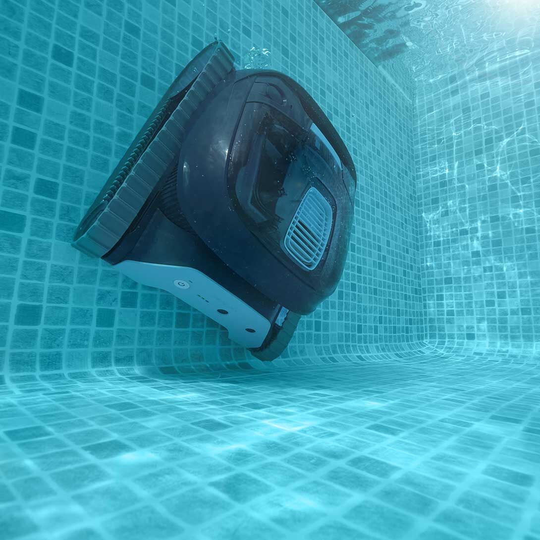 Dolphin Liberty 200 scrubbing a tiled pool wall underwater