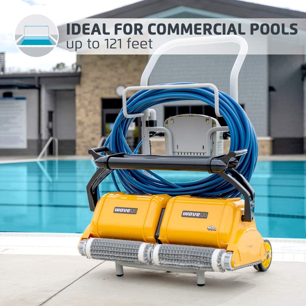 Dolphin Wave 120 on its caddy beside a commercial pool
