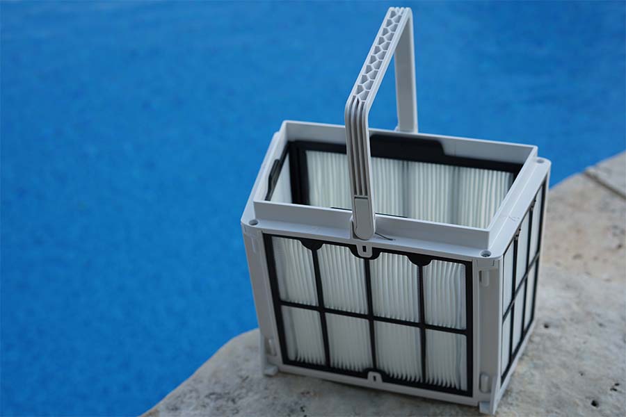 Dolphin Cayman Filter Basket on Rock